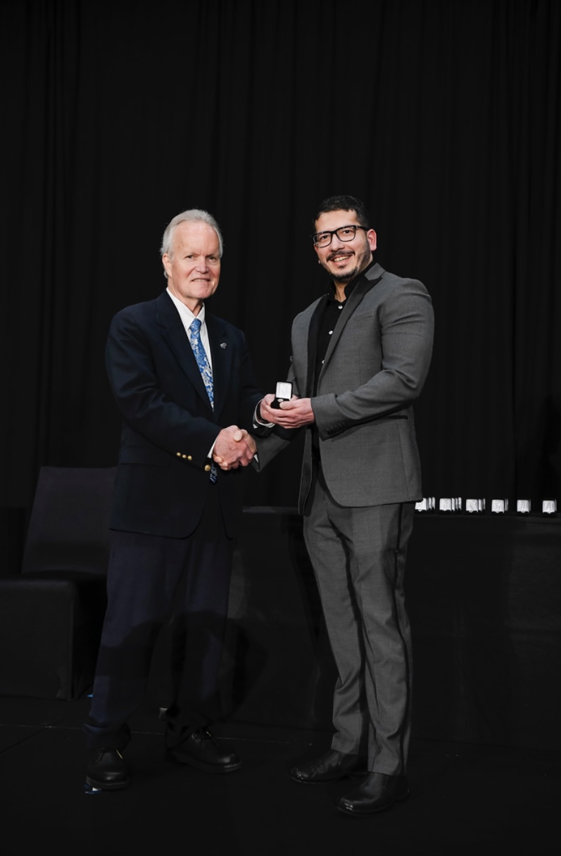 Dr. Sahil Manhas receiving his American Board of Endodontics Diplomate pin
